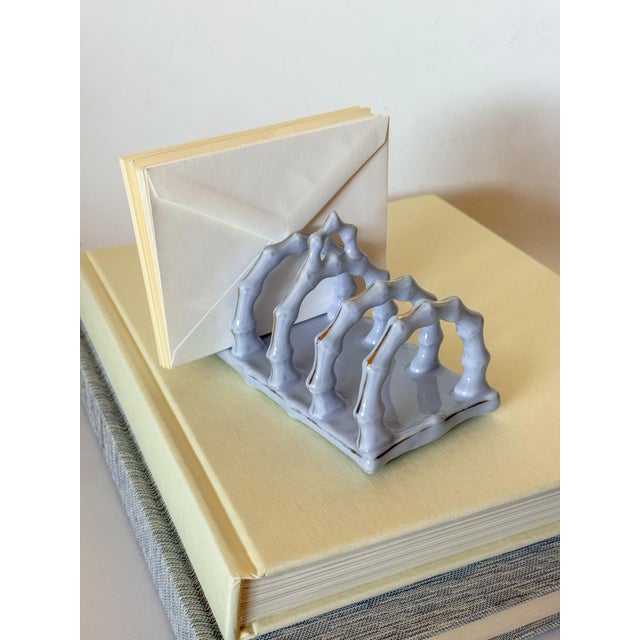 Absolutely fabulous antique late 19th century Limoges porcelain blue toast rack with gilt line details. The blue is really...