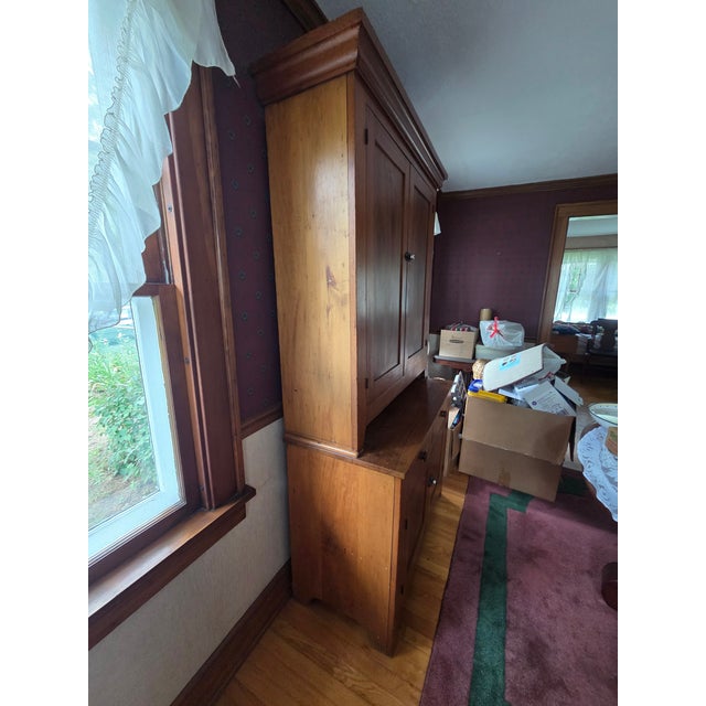 This piece is a 19th century (circa 1860-1880) step-back hutch (kitchen cabinet). This piece is most likely constructed of...