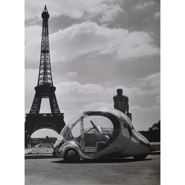 Robert Doisneau Paul Arzens' "Electric Egg" in front of the Eiffel Tower Silver Print 1980 Signed lower right 40.5 x 33.5...