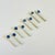 A set of 8 vintage ceramic chopstick rests. Each has a lovely hand painted floral design and finished in blue and white...