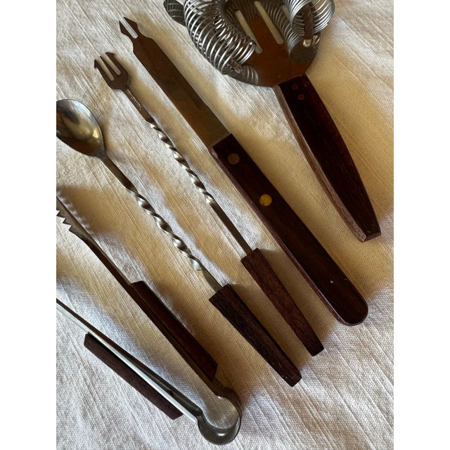 This is a 5 piece barware set. Stainless steel and Rosewood Japan.