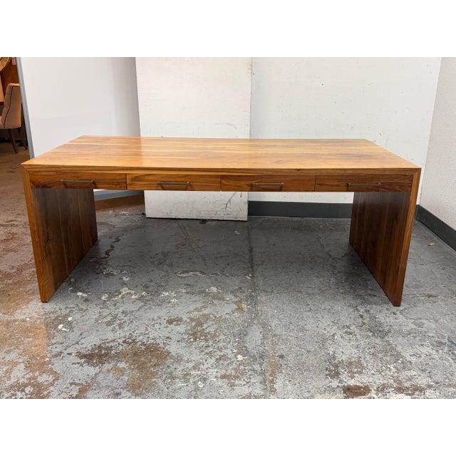 Design Plus Gallery presents a Solid Walnut Desk Customized + One of a Kind. The large, expansive desk has substance and...