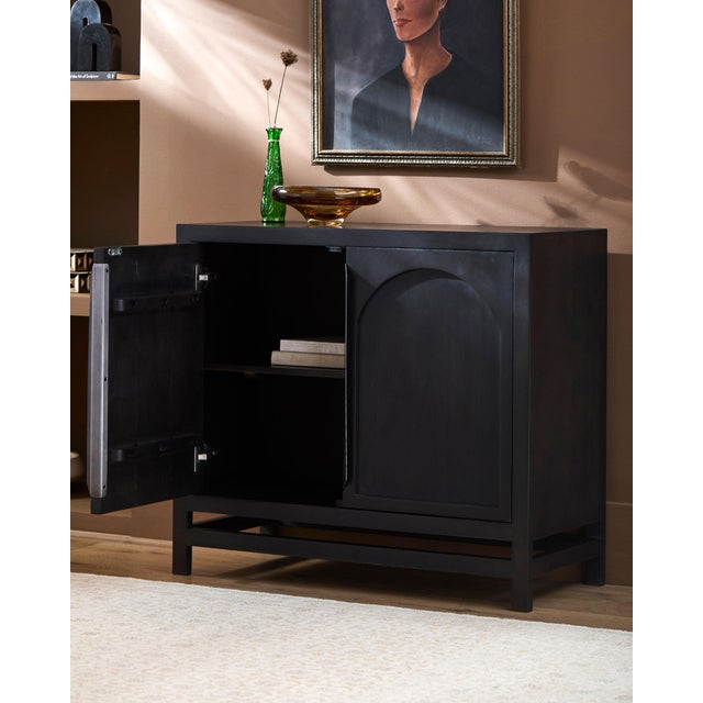 Introducing the Byron Cabinet, a stunning piece that effortlessly merges minimalist modern design with the natural...