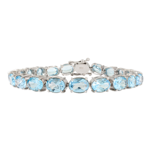 Handcrafted 7x5 Mm Oval Cut Blue Topaz Statement Bracelet in 925 Silver - Birthday Gift