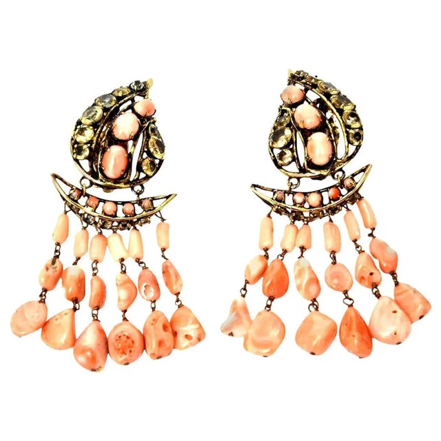 This is part of Chairish’s Costume Jewelry assortment. This stunning pair of signed vintage Iradj Moini Coral, Citrine and...