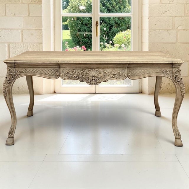 Carved from solid oak in the celebrated Liégeoise manner, the shaped top features a molded edge and gently incurved...
