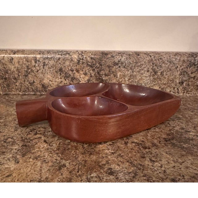 Beautifully crafted mid-century divided serving dish made from solid teak wood. This piece features three rounded...