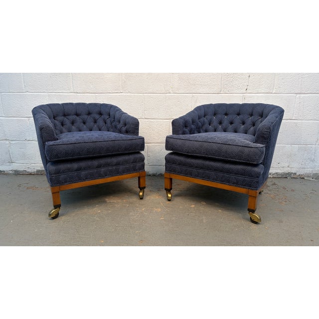 Introduce timeless sophistication and effortless comfort to your living space with this striking pair of Mid-Century...