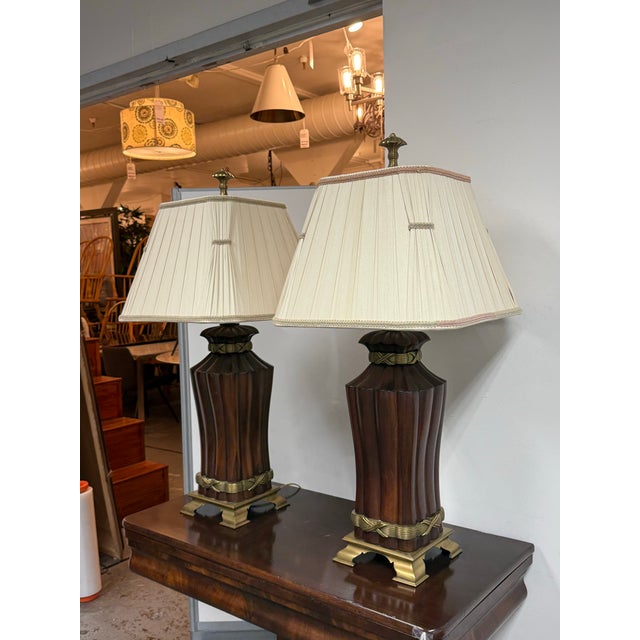 Design Plus Gallery presents the Pair of Table Lamps by John Burke for Decorative Craft. These Wood & Brass Table Lamps,...