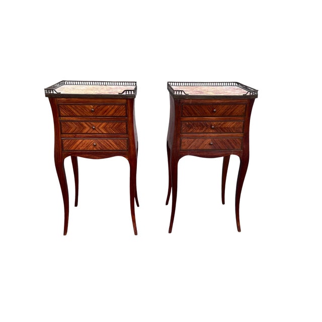 Pair of Antique French Marble-Top Bedside Cabinets With Hand-Cut Dovetail Drawers An elegant pair of antique French...
