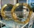 These stunning vintage brass “porthole” mirrors are the work of Artisan House founders Curtis Freiler and Jerry Fels (C....