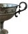 Wine Pedestal Bowl with Bows & Ornate Handles is a stunning piece of tableware, characterized by its elegant design and...