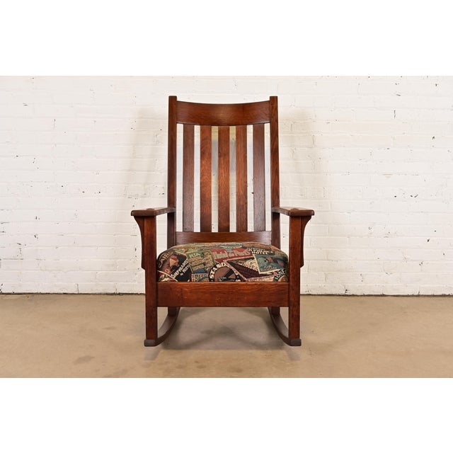 A gorgeous antique Mission or Arts & Crafts period rocking chair In the manner of Stickley Brothers By J.M. Young & Sons...