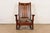 A gorgeous antique Mission or Arts & Crafts period rocking chair In the manner of Stickley Brothers By J.M. Young & Sons...