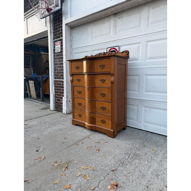Victorian Antique Victorian Oak Serpentine Front Five-Drawer Highboy Dresser With Ornate Carved Crest For Sale - Image 3 of 12