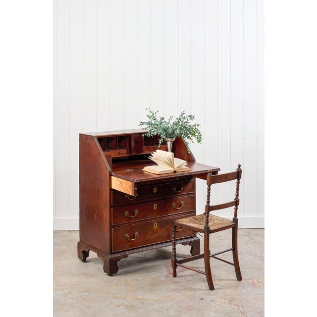 This stunning Georgian bureau features original 18th century hardware, along with coloring and patina only decades of use...