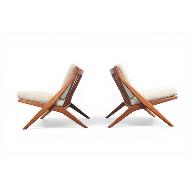 Origin: Sweden Designer: Folke Olhsson Manufacturer: DUX Era: 1960s Materials: Teak, Wool Measurements: 25.5″ wide x 33″...