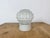Vintage industrial ceiling or wall light made in former Czechoslivakia during the 1970s. It features a white porcelain...