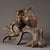 This charming sculpture depicts two owls perched side-by-side on a gnarled tree branch and stump. The piece is crafted...