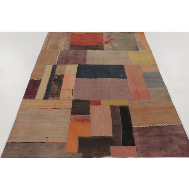 This 5x7 vintage patchwork rug is a distinctive addition to Rug & Kilim’s collection, reflecting the craftsmanship of...