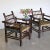 Stunning pair of 1940's French oak and woven armchairs by Charles Dudouyt. Beautiful carved wood detail throughout with...