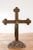 A contemporary lost wax bronze religious cross with trifold extremities and rocky base. Created with the traditional...