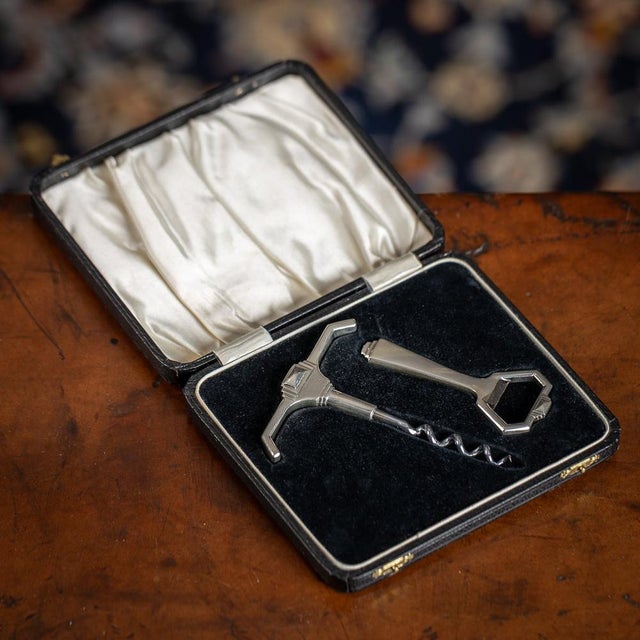 Superb mid-20th Century art deco style solid silver corkscrew and bottle opener, the corkscrew has a steel helix screw...