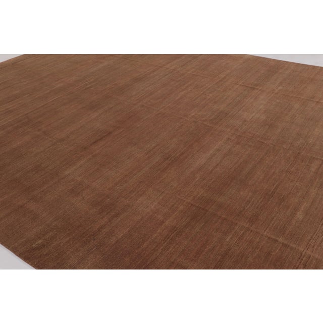 Hand-knotted in wool, this monumental 11x15 rug is a rich new addition to Rug & Kilim’s Textural rug collection, featuring...