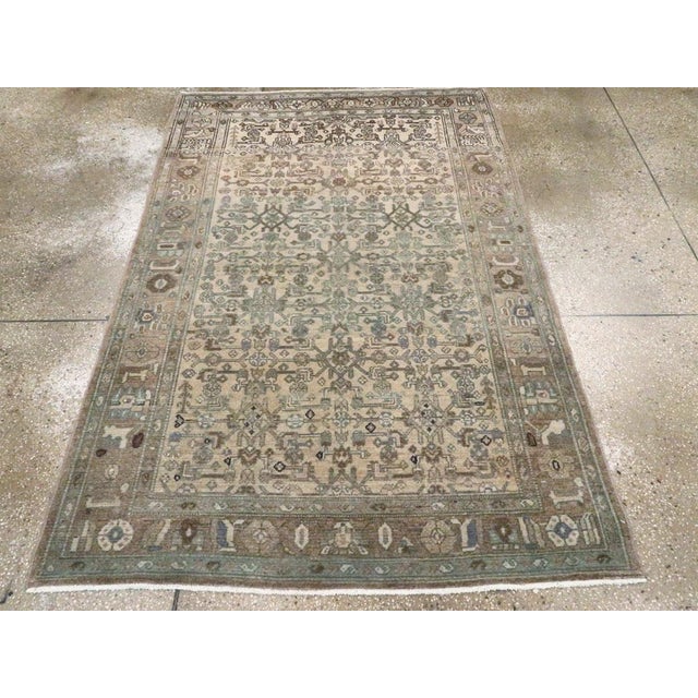A vintage Persian Malayer accent rug handmade during the Mid-20th century. Measures: 4' 3" x 6' 5"