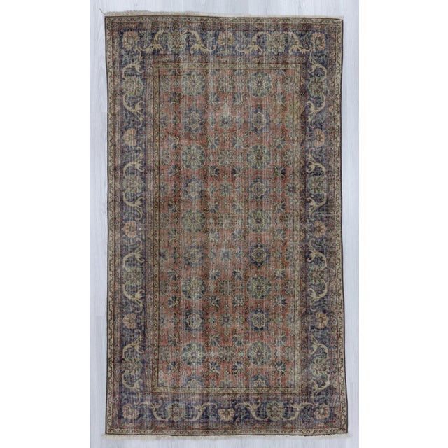 Vintage hand knotted rug from Isparta region of Turkey. In good condition. Approximately 50-60 years old.