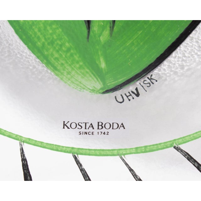 A set of four "Tulipa" glass plates designed by Swedish artist Ulrica Hydman (1938-2018) for Swedish glass company Kosta...