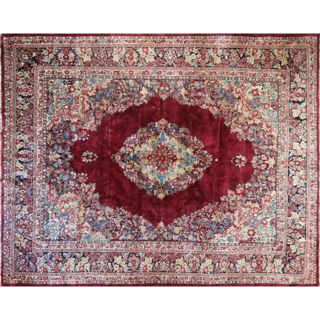 Indulge in the timeless elegance of our Antique Handmade Northwest Persian Sarouk Rug, a precious gem dating back to...