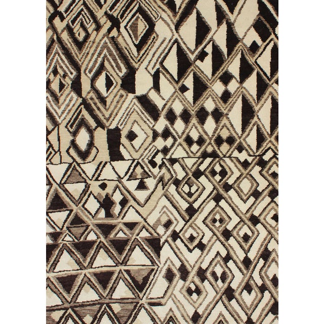 Tribal Moroccan Rug, rug , country of origin / type: India / Moroccan, circa Early-21st Century. Measures: 6'0 x 9'0. This...