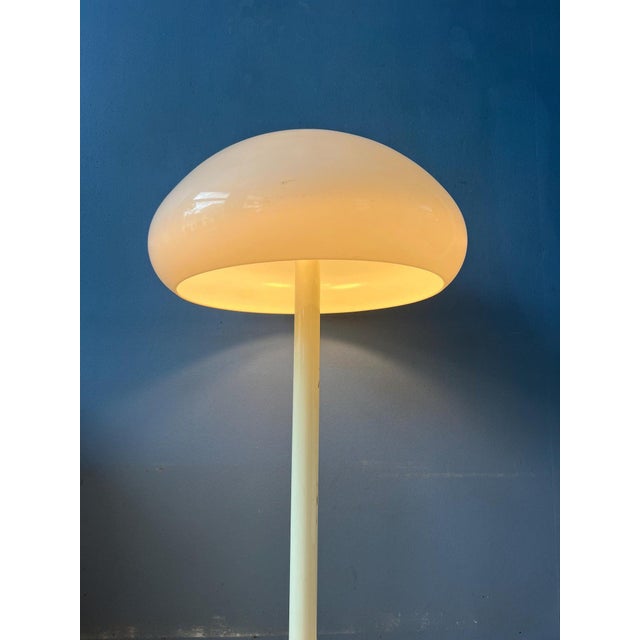 Mid century Dijkstra mushroom floor lamp with white acrylic glass shade. The lamp requires two E27/26 lightbulbs and...