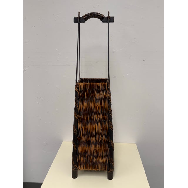Design Plus Gallery presents a Japanese Ikebana Flower Basket. This woven basket has a tall square form, variegated reed...