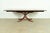 An exceptional Georgian or Regency style pedestal extension dining table In the manner of Baker Furniture USA, Circa...