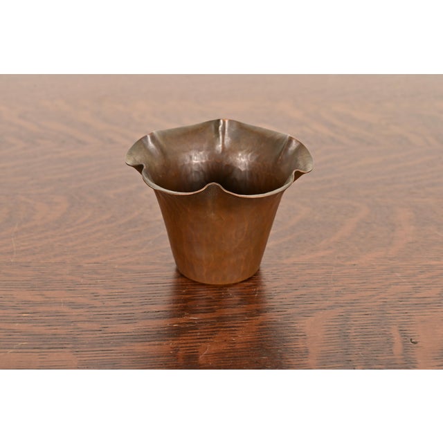 A gorgeous Arts & Crafts period hand hammered copper vase with scalloped edge By Roycroft (signed with impressed orb and...