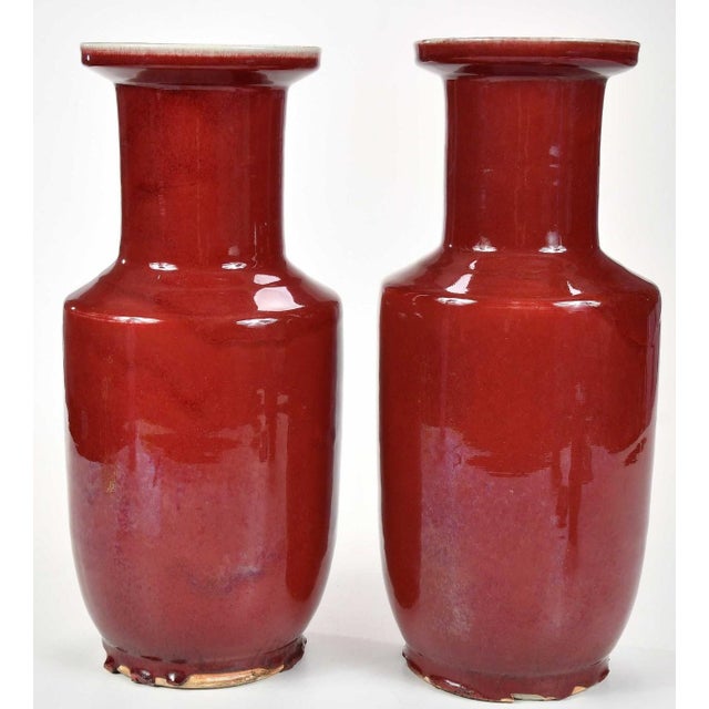 probably late Qing dynasty, porcelain, of baluster form in deep red glaze, 17-1/2 x 7-1/2 in. Provenance: Private...