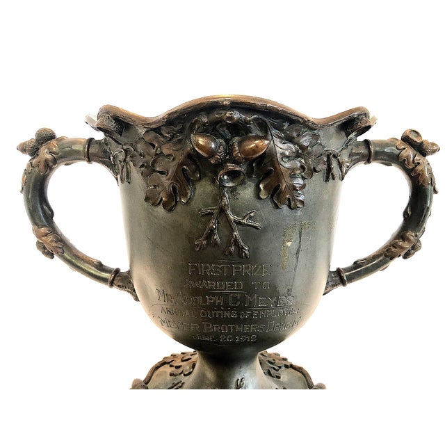 On offer is a trophy shaped in a classic "loving cup" style. Going back centuries, the shape is identifiable by its deep...