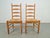 Set of 2 vintage Brutalist Charlotte Perriand-style ladder chairs, wicker, 1960s This set of 2 French dining chairs in the...