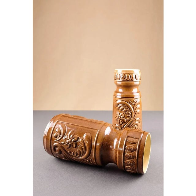 These are two typical vases from East German production in the 1970s. Small vase 21 cm H Diameter 9 cm Large vase 24 cm H...