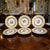 This elegant set of 6 vintage (ART B China) round porcelain dishes features a heavily gilded border and floral center...