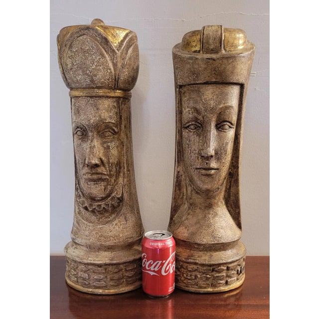 Impressive pair of well weighted king and queen statues in the form of a chess piece. Designed with a distressed finish...
