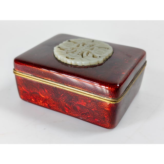 We are selling this pretty marriage. This piece features a 19th century Chinese white nephrite jade pendant plaque with...