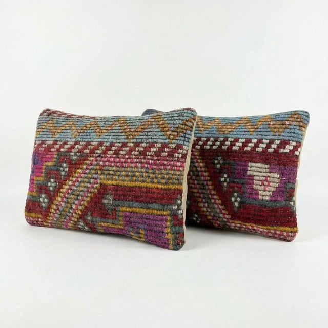 This beautiful 14'' x 20'' Turkish Kilim pillow cover set was made from authentic handwoven flatweave kilim. The...