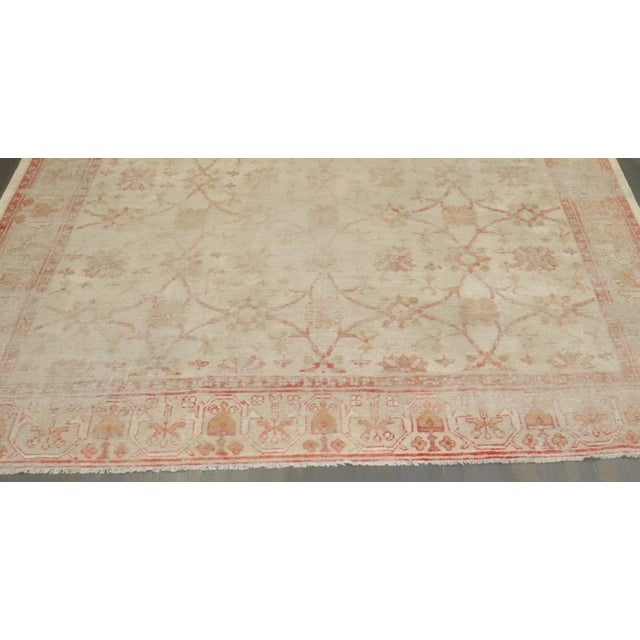 A late 19th Century Square Turkish Oushak Ghiordes Rug
