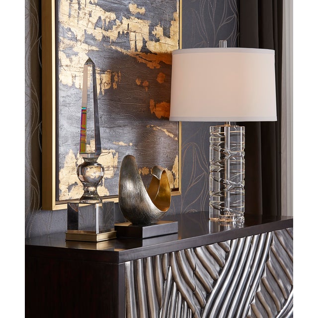 hand cut and polished finial sculpture on solid brass base.