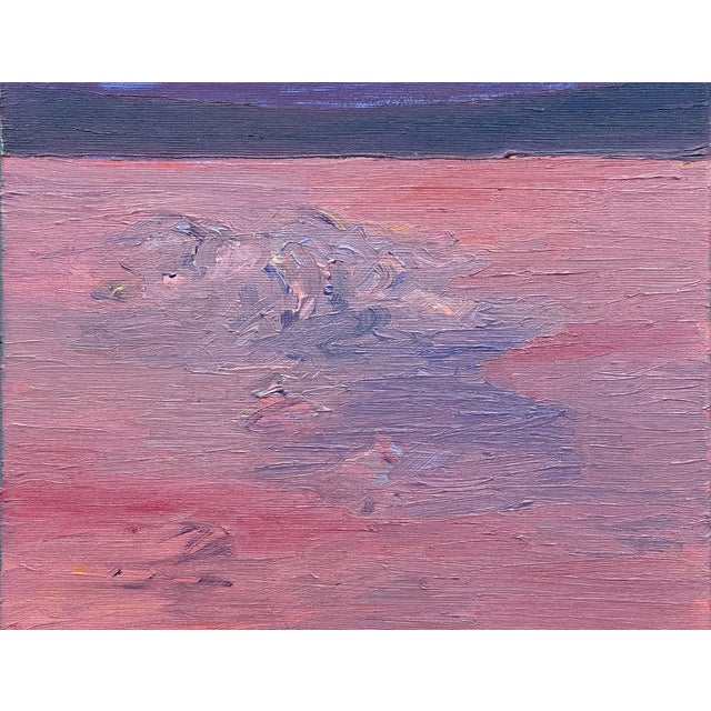 The artwork shows an impressive landscape with intense colors. The horizon is a deep purple that contrasts with the bright...