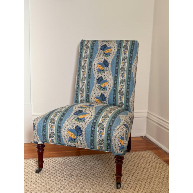 Antique Napoleon slipper chair, reupholstered in Dècors Barbares Casse-Noisette in Blue. Beautiful wood legs are sturdy...