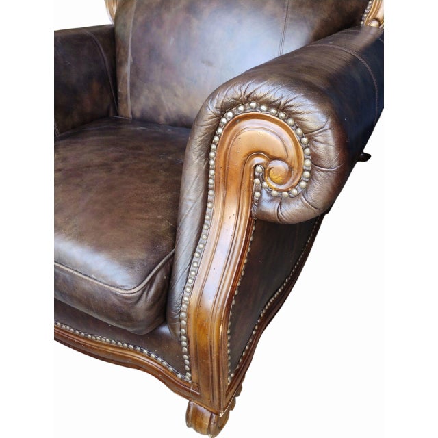 Indulge in the Rich Heritage and Exquisite Craftsmanship of the Aria Leather Chair and Ottoman Set. For Sale - Image 11 of 12